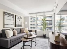 Stylish 1BR Condo with Patio Steps from Waterfront