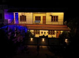 Coorg peacock feathers home stay, място за настаняване на самообслужване в Кушалнагар