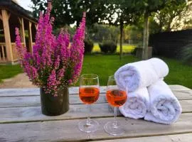 "Huisje op de Veluwe" met privé Jacuzzi en Bar!