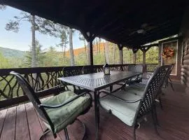 The cozy Lazy Laurel with year-round mountain views, hot tub, fire pit