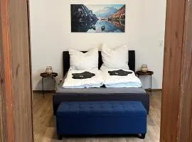 Five-O Apartment Precht - QueenSize Bett