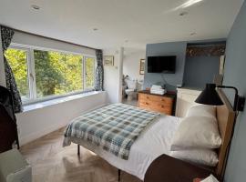 The Guest Room at Champs Cottage, hotel que aceita pets em Isle of Jersey