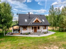Rodzinne wczasy nad Czarną Hańczą, hotel in Okołek
