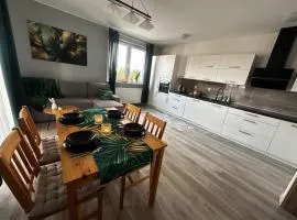 Urban Green Września,Przytulny apartament z parkingiem