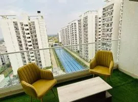 Skyline 1bhk Central Park Flower valley The Room