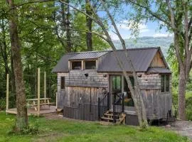 Caboose Tiny Home on river with hot tub near Stowe