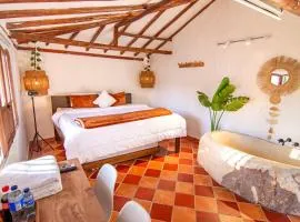 Exclusiva cabaña con tina en piedra, fogata y cine