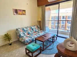 Elegant 1BHK Couples Getaway with River View, Pool, Gym, Amenities - Near Candolim Beach