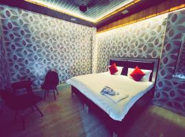 Hotel O Green Land Guest House, hotel v destinaci Tibri