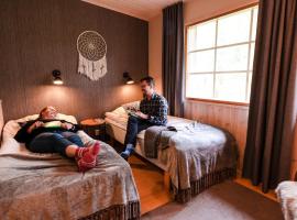 Isokenkäisten Klubi - Wilderness Lodge, hotel v destinaci Kiviperä