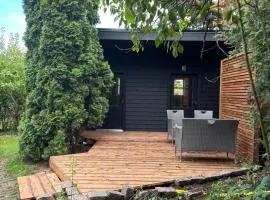 Small guesthouse in garden