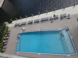 Beach Escape with Balcony & Resort Amenities