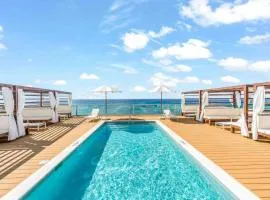 The Sands #1 - New 7Mile Beach Condo with Rooftop Pool & Luxe Interiors