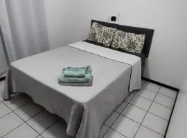 Quarto em casa de família
