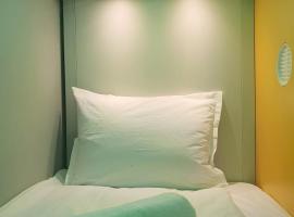 Green Cube Capsule Hostel