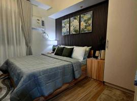 Cozy Condo in Holland Park Southwoods With Pool, acomoda&ccedil;&atilde;o em condom&iacute;nio em Bi&ntilde;an