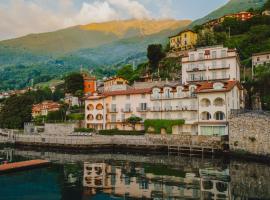 Exclusive Garden Apartment with Lake View & Pool, hotel in Musso