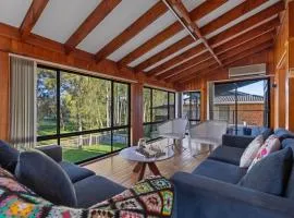 San Remo Charm with Waterfront Views and Sunroom
