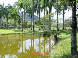 Suite em Macae com mini fazendinha e piscina