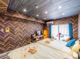 オーシャンビュー窓から見える景色を思い出に The琉球タワー 10D, hotel in Yonabaru