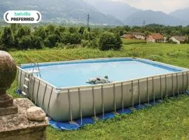 Apartment in Valbelluna with Pool & Dolomites View