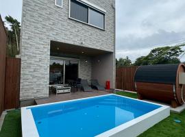 Comlien Villa Resort، مكان إقامة مع الخدمة الذاتية لإعداد الطعام في تاتياما