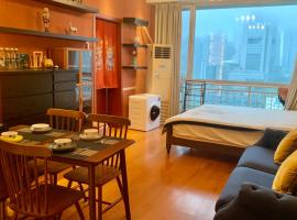 Beijing CBD area - Cozy family suite with queen bed and city view, hotel v Pekingu