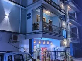 Blue building Service Apartments and kitchen Facility