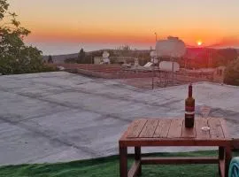 Cottage in Historic Village & Rooftop Sunset views