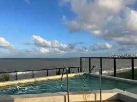 Luxuoso Flat pé na areia no Restinga