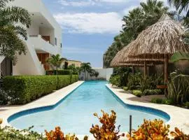 Aqua Zensa, luxe appartement 2 min van Mambo Beach