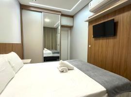 Apartamento de Luxo com Garagem Privativa e Wi-Fi Rápido, hotel u gradu Palmas