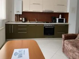 Apartament,4 paturi, 2 dormitoare,Living cu bucatarie