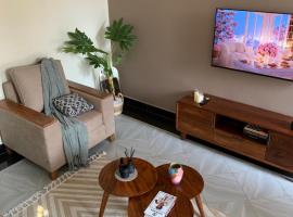 True's cozy homes, hotel en Kira