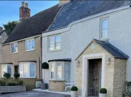 Cottage on high street, own parking and EV charger