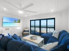 Luxury direct oceanfront corner with large private balcony, heated pool and garage