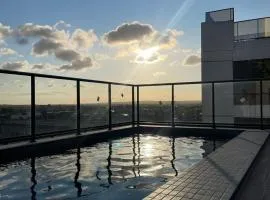 Studio na praia Piscina, academia e lavanderia