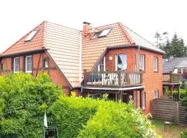 Birkmaase 12 Kapitänshaus Jacqueline 4-Sterne Komfort Maisonette im OG links