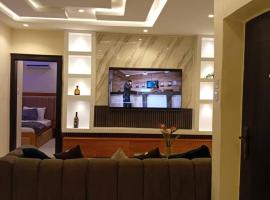 Less2More Luxury Suites, Hotel in Agege