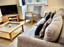 Vicarage Court detached bungalow, μπανγκαλόου σε Όσβεστρι