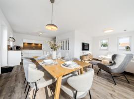 Küsten Suite Haus Grachtenwinkel direkte Wasserlage, 2 Terrassen, 106qm, Neubaugebiet، فندق في غريتسيل