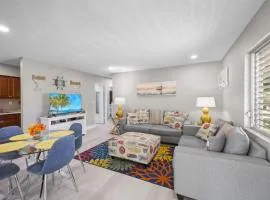 Peaceful condo with pool and steps to beach