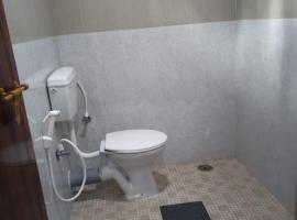 South point homestay, hotel in Virajpet