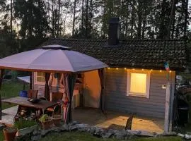 Cozy cottage in the woods near lake & sauna