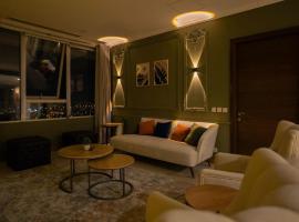 Gold Crest Mall Luxury Apartments with Balcony by Prime Lodging in DHA Lahore, apartment in Lahore