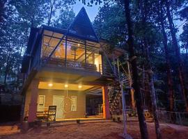 Wild root stay- Aster Chalet, chalet de monta&ntilde;a en Wayanad