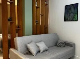 Studio Aconchego Poços - Minimalista e bem localizado