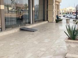 شقق نصف القمر للشقق المخدومة, acomoda&ccedil;&atilde;o com cozinha em Ḩaql