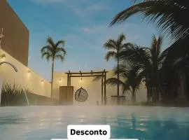 A Casa Paradisiaca ll Luxo Piscina Super Quente até 50 graus de Temperatura Aquecimento Elétrico com Sauna e Lavanderia com Roupa de Cama e Banho