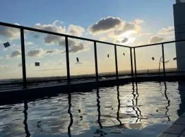 Studio de influencer a 02 min da praia